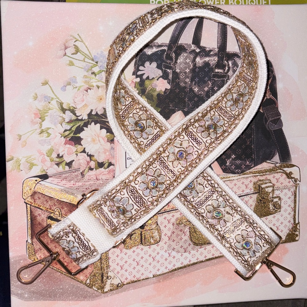 White Canvas with Gold embellishment and hardware feature adjustment on Strap